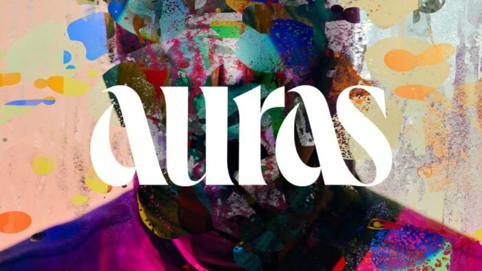 The word "auras" over a colorful abstract